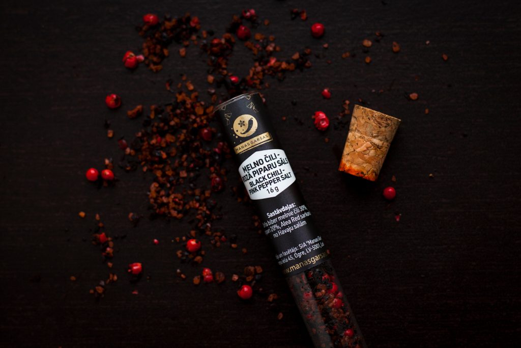 Black chili  pink pepper salt in a small tube